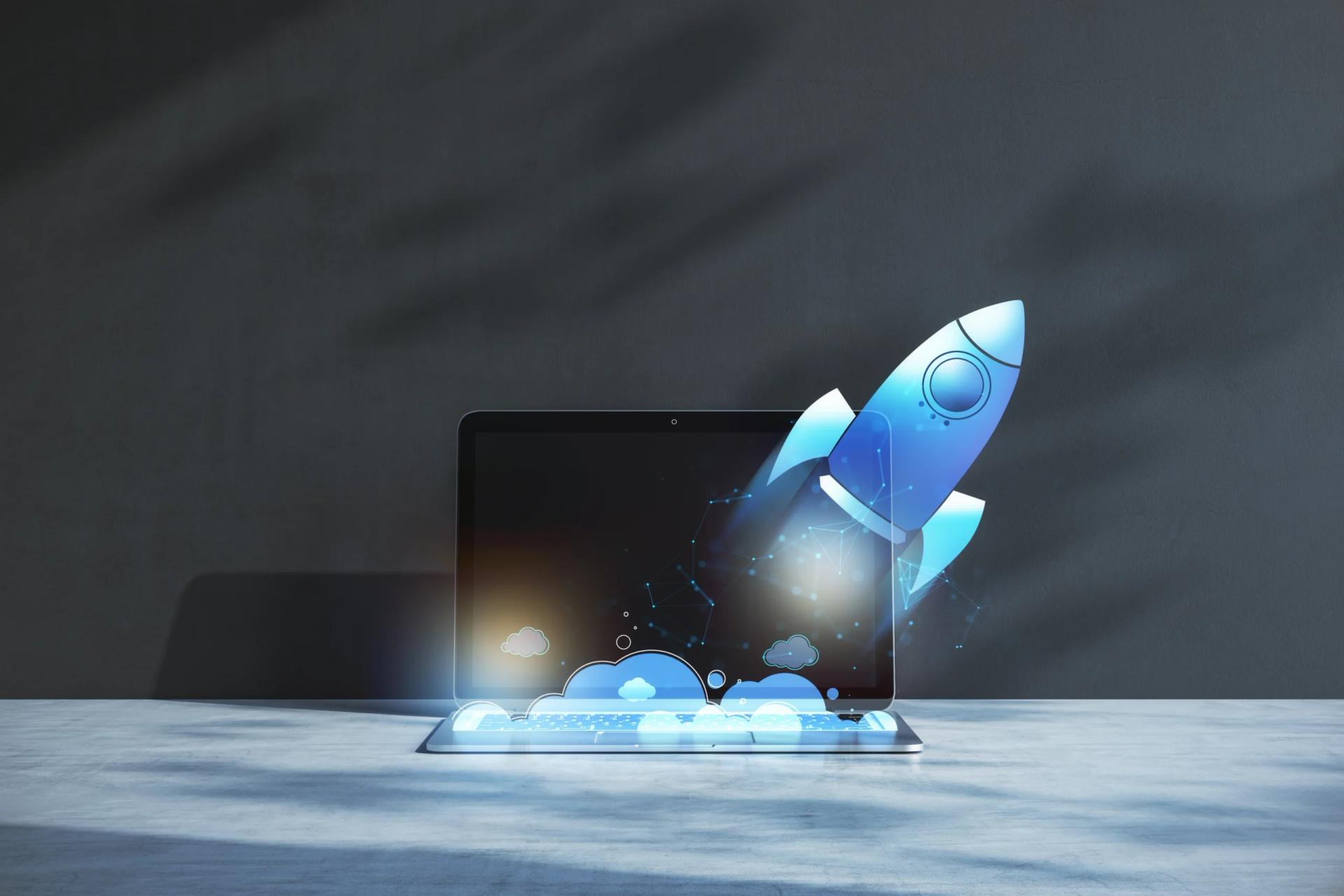 Laptop with rocket hologram